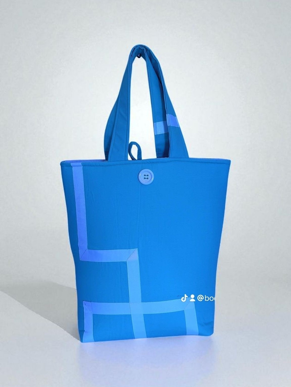 Bright Blue Geometric Tote Bag with Button Closure